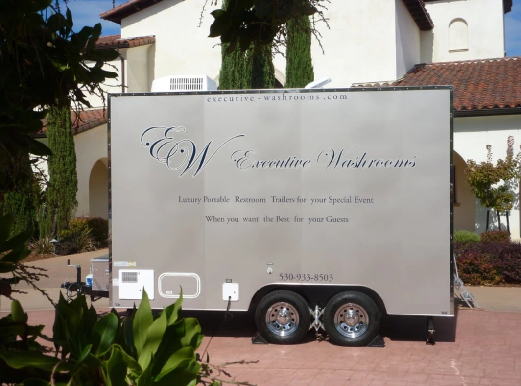 Luxury portable restroom trailer setup at event